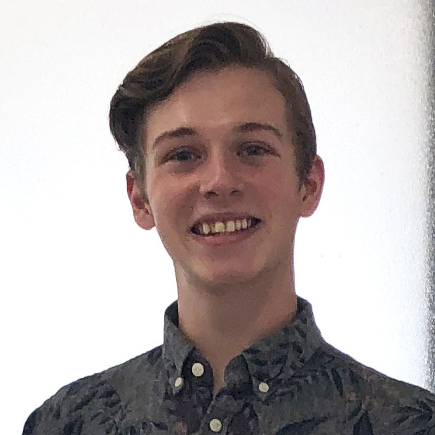 A person smiling for the cameraDescription automatically generated with medium confidence